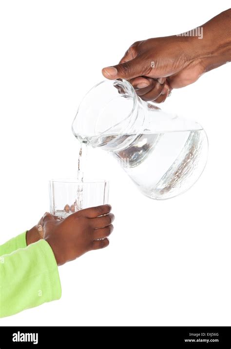Hand Of An African Adult Man Is Holding A Jug Of Water And Pouring It