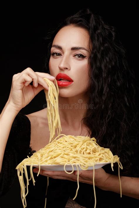 A Beautiful Girl Eats With A Fork Spaghetti With Red Lips Stock Image Image Of Cute Fork