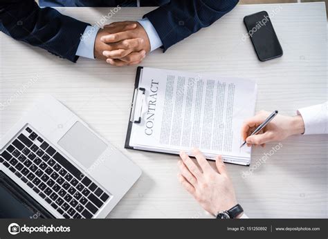 Businessman Signing Contract — Stock Photo © Dmitrypoch 151250892