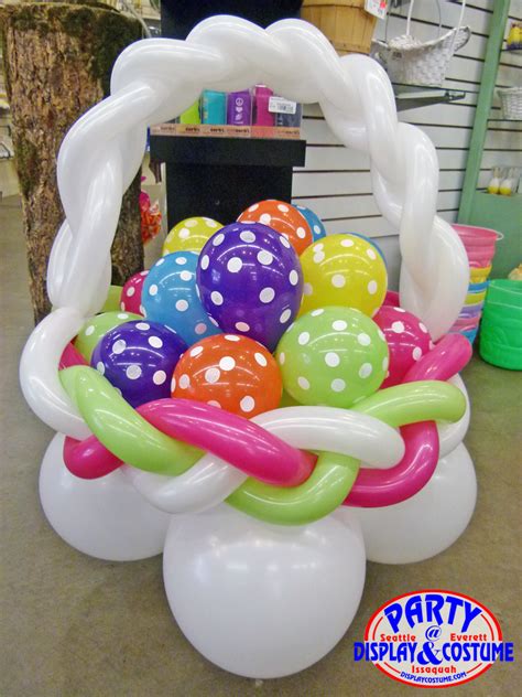 White Easter Basket With Bright Colorful Easter Eggs Balloon Sculpture Cute Idea For Easter