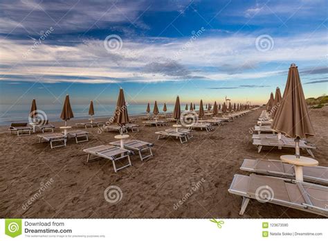 Morning On The Beach With Empty Chaise Lounges Stock Photo Image Of Blue Coastline