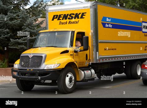 A rented Penske rental truck makes it way through traffic in Santa Fe