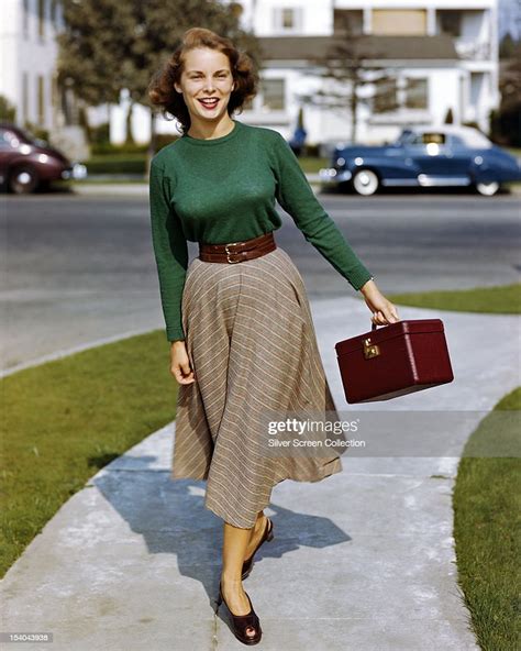 American Actress Janet Leigh Carrying A Make Up Case On A Suburban