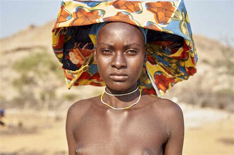 Young Mucubal Woman With Her Traditional Headscarf Mucubal Tribe