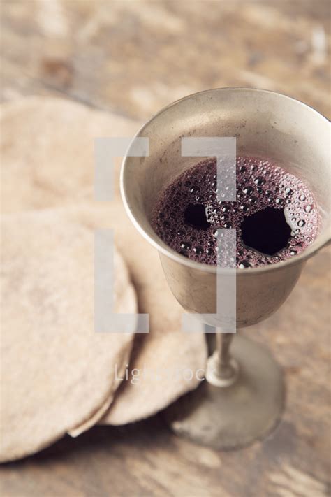 Unleavened Bread And Chalice Of Wine On Wooden — Photo — Lightstock