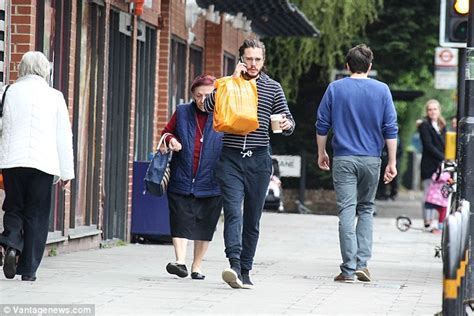 Game Of Thrones Kit Harington In Tracksuit Bottoms And Glasses In