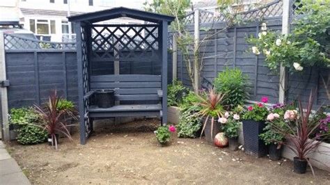 25 beautiful garden path ideas & pro landscape design tips on easy diy backyard walkways with gravel, brick, stepping stones, wood, pavers, or even a grassy area is beautiful. cuprinol urban slate arbour | Cuprinol urban slate, Back ...