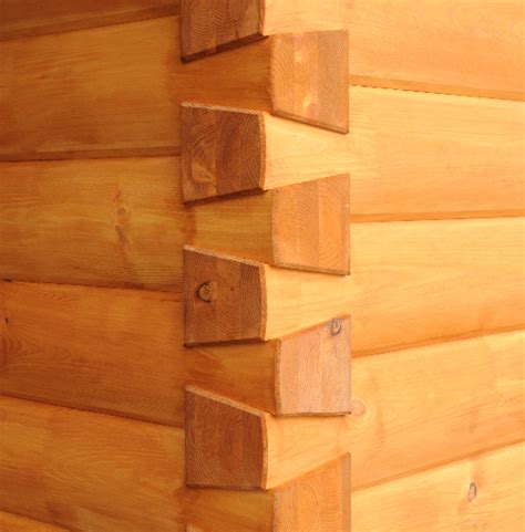 The design of a log cabin notch (i.e. Using Milled Logs to Build your Log Cabin