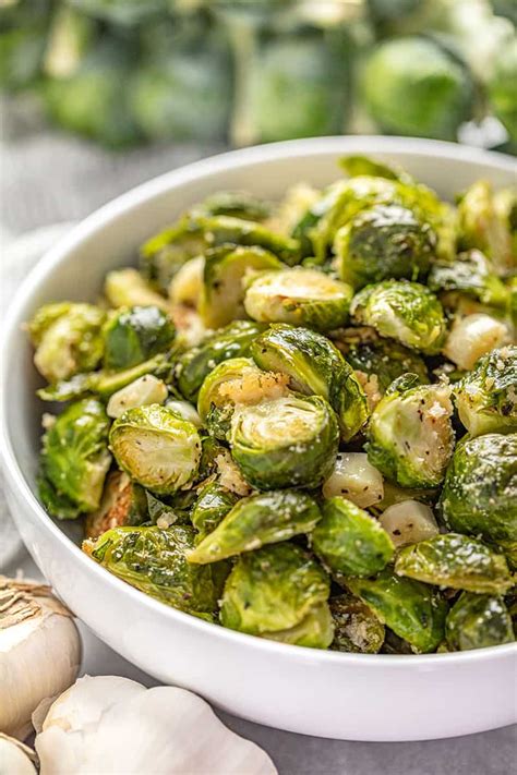Add the sprouts to the bacon along with the butter and garlic, over a medium heat, tossing so everything is nicely combined. Garlic Butter Roasted Brussel Sprouts