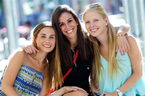 Group Of Beautiful Young Girls In The Street Shopping Day Photo