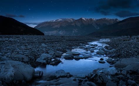 Night Sky Stars Mountain Landscape Stone River Wallpaper 1600x1000