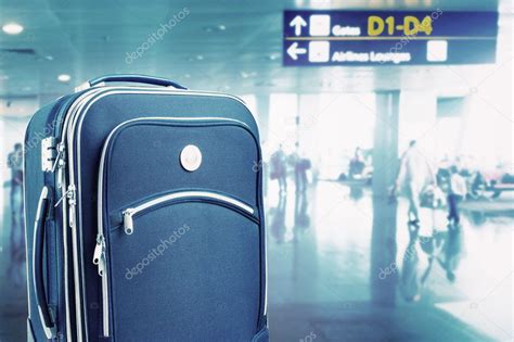 Suitcase At The Airport — Stock Photo © Nomadsoul1 33679393