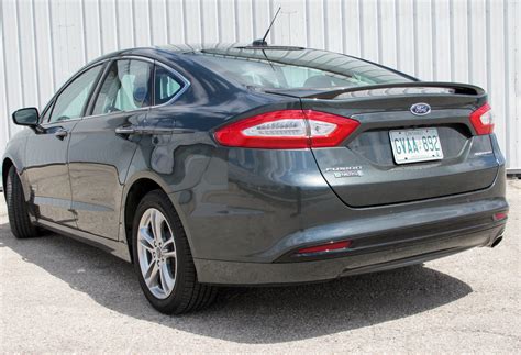Two sedans and two edmunds.com editors face off: 2015 Ford Fusion Energi Review - WHEELS.ca