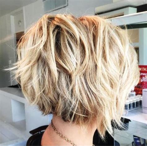Wispy bangs are a great addition to this hairstyle, however, it would look interesting with blunt fringe as well. 20 Collection of Messy Choppy Layered Bob Hairstyles