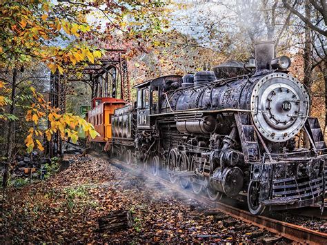 These train jigsaw puzzles help your kids have a fun time and learn new things too. TRAIN'S COMING 1000 PIECE Jigsaw Puzzle Sunsout