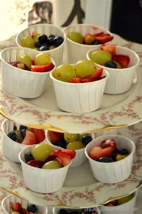 While a fruit salad gets the job done, fruit skewers do it even better. individual fruit salad cups | Christmas party finger foods ...