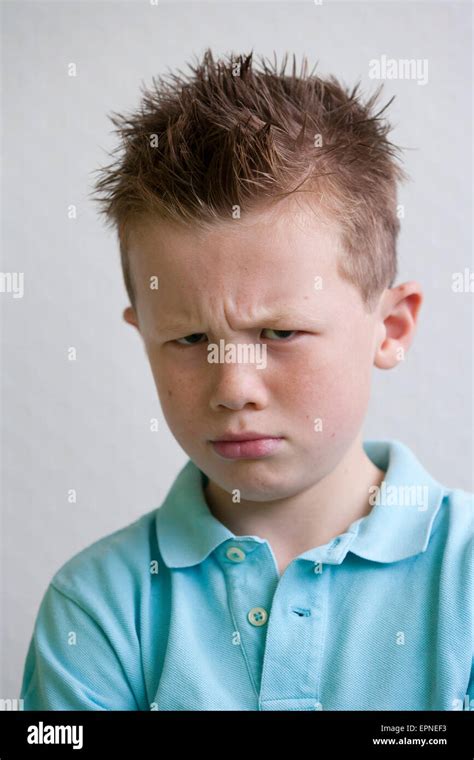Portrait Of An Irritated Eight Year Old Boy Stock Photo Alamy