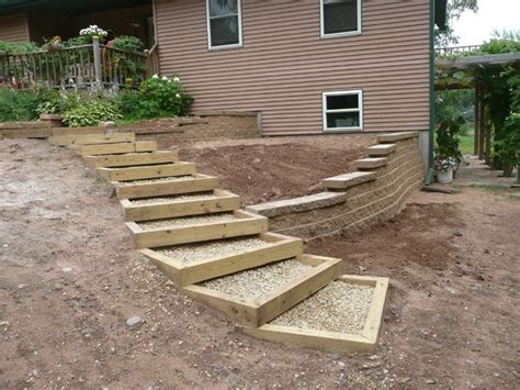Retaining wall with driveway as a professional concrete contractor, we offer concrete driveway replacement as a standalone service. The Natural Touch Landscaping and Lawn Care | Backyard ...