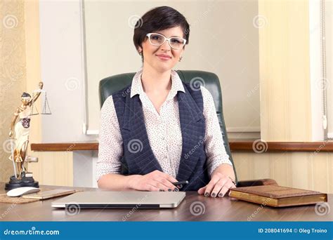Successful Woman Lawyer At Work In The Office Advocacy And Legal