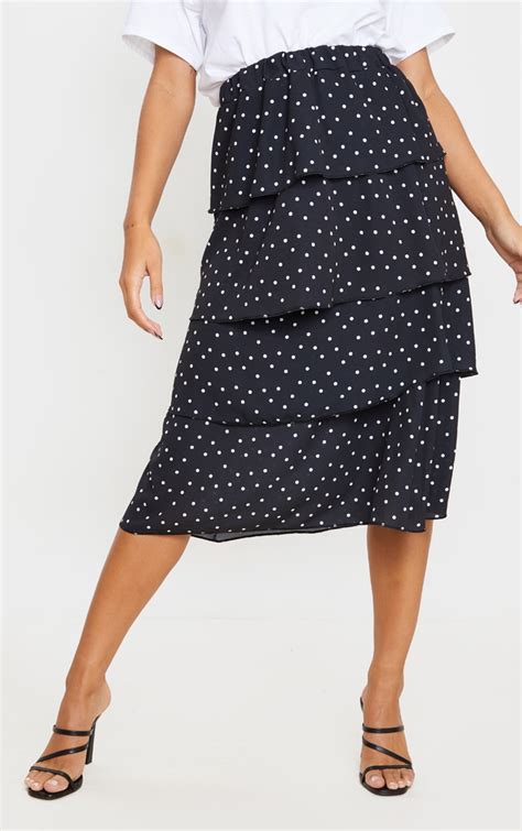 black polka dot tiered midi skirt skirts prettylittlething ca