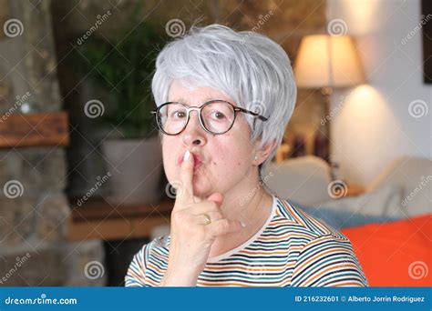 Senior Woman Asking For Silence With Gesture Stock Image Image Of