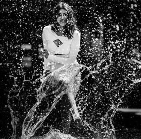 kajal agarwal playing with water looked extremely hot in a white dress newstrack english 2