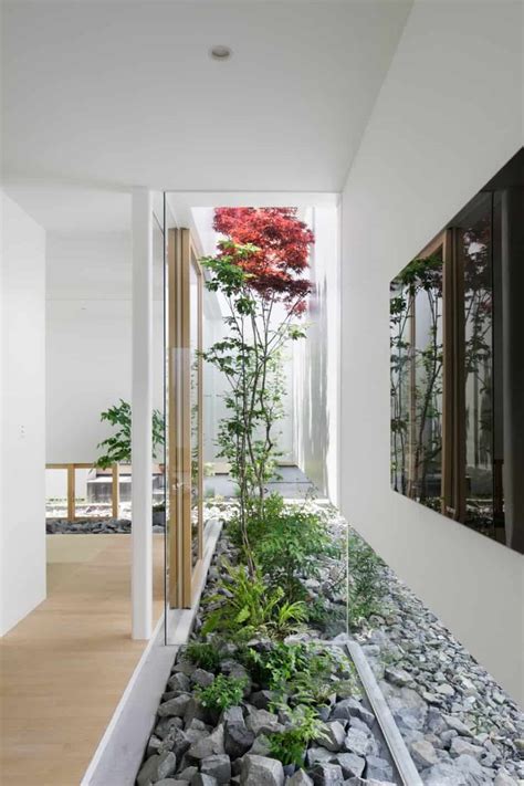 House With Floating Facade Glass Walls And Interior Courtyard