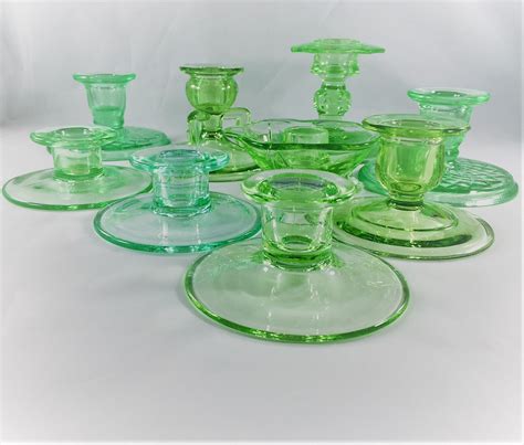 collection of 9 vintage candle holders green depression glass uranium glass old fashioned