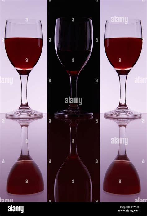 Wine Glasses A Reflection On A Light Red Background Backlighting Stock