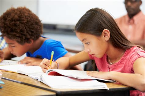 Pupils Studying At Desks In Classroom Philly Spotlight