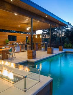 There are a number of ways to enhance a pool area, including decks, patios, and fences. Luxury Pool with Modern Cabana - Modern - Pool - Atlanta ...