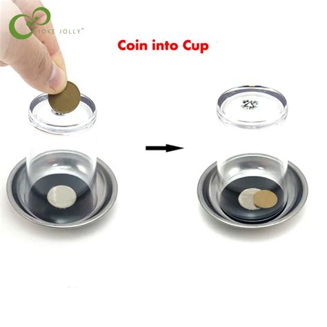 Magic Trick Coin Penetrates Into The Cup Coins Through The Glass