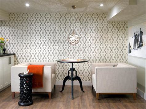 Neutral basement features a sectional and wood accents. Basement Seating With Contemporary Wallpaper : Designers ...