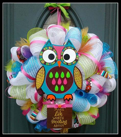 This owl centerpiece would add an outdoor feel to any table with autumn leaves and natural elements. Owl wreath | Owl decor, Owl birthday decorations, Owl wreaths