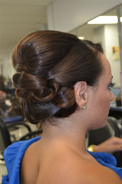 This style is also great because it's low maintenance and involves minimal styling effort. updo chic wedding upstyle smooth shiny barrel curls | Long ...