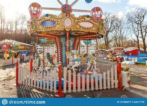 Vintage Merry Go Round Flying Horse Carousel In Amusement Holliday Park