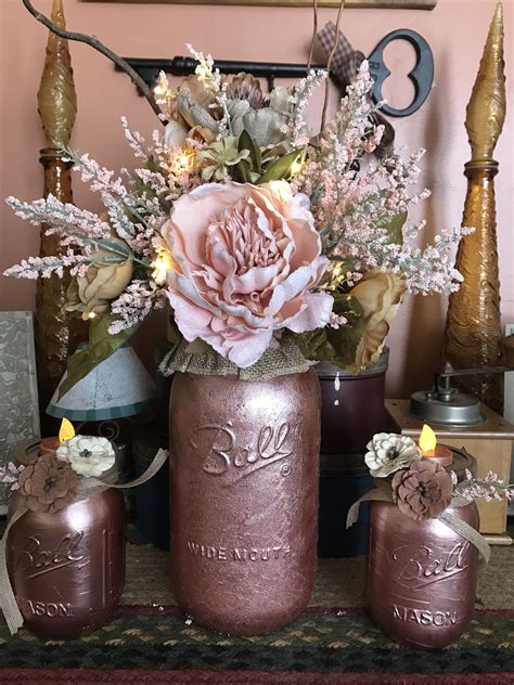 Rose gold mason jar centerpiece. | Rose gold bridal shower, Wedding