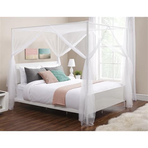 White armchair next to canopied bed in pink pastel bedroom interior with poster and carpet. DHP Canopy Queen Metal Bed in White - Walmart.com ...