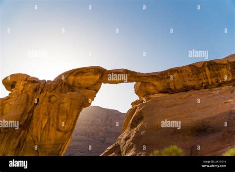Sunny Day In Wadi Rum Desert And A Famous Rock Arch Jordan High