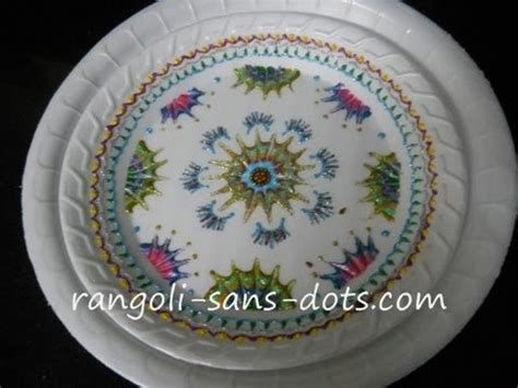 Dip the tip of your spoon into the middle of the sauce and make a flourish across the plate. Paper plate art / thermocol art and craft - a simple idea ...