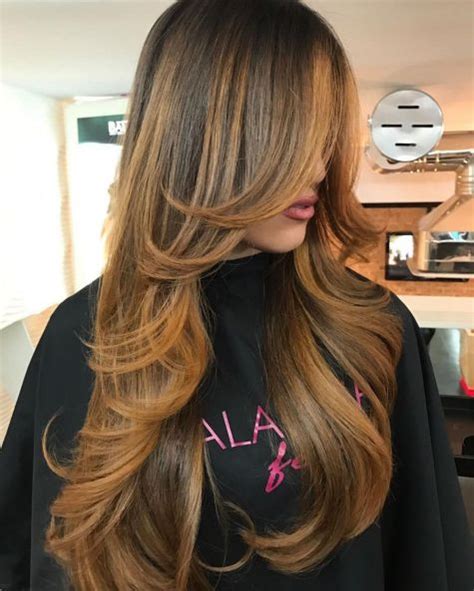An ombre with light caramel highlights also provides a weightless and airy feeling to dark, dense strands. 80 Cute Layered Hairstyles and Cuts for Long Hair in 2019