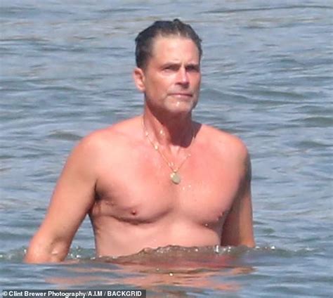 rob lowe 57 rises dripping wet from ocean during sizzling beach day daily mail online