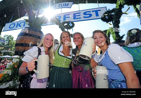 Men And Women Toast In The Traditional Opening Parade At Oktoberfest In Munich Germany 17