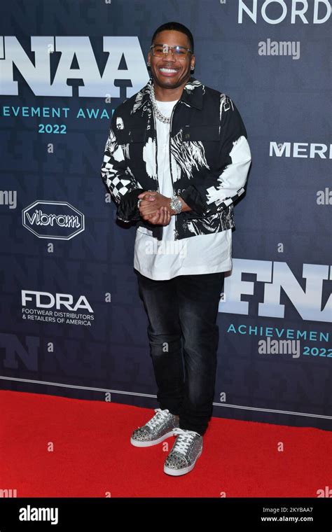 Nelly Attends The 36th Annual Footwear News Achievement Awards At