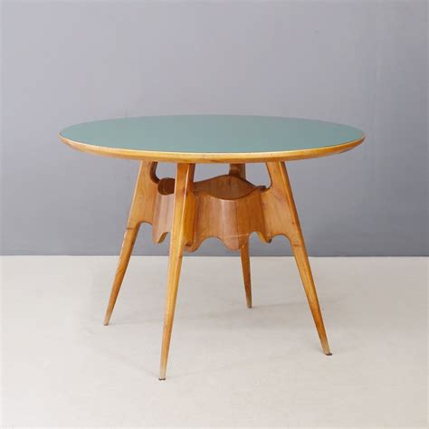 Maybe you would like to learn more about one of these? Paolo Buffa MidCentury dining table with green glass top ...