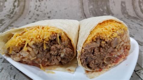 • in this cooking video the wolfe pit shows you how to cook down a chuck roast till fork tender and makes mexican beef, cheese and refried bean burritos. Beef Bean Cheese Burritos - Average Guy Gourmet