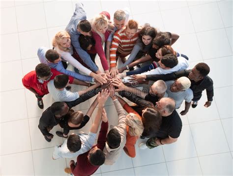 Group Of People With Hands Together Teamwork Concepts Stock Photo