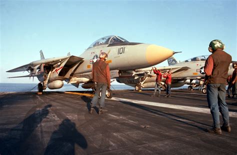 A Fighter Squadron 143 Vf 143 F 14a Tomcat Aircraft Is Readied For