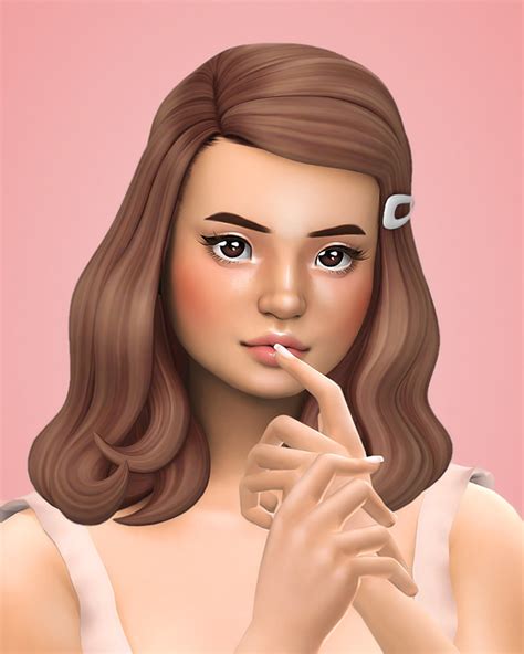 A Woman With Long Brown Hair Is Holding Her Finger To Her Lips