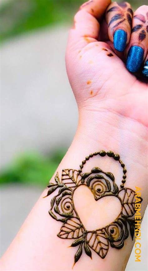Big and small flowers combine creating an excellent henna tattoo deisgn. 50 Wrist Mehndi Design (Henna Design) - August 2019 ...